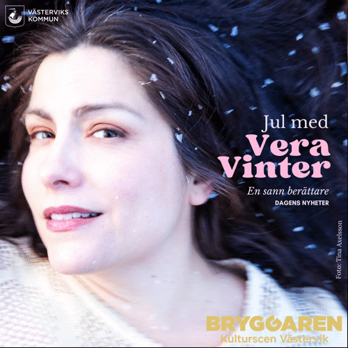 På bilden syns Vera Vinter med ett brett och glatt leende.