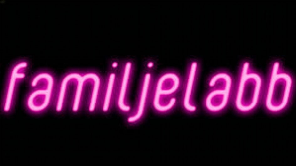 Bildtolkning: Texten Familjelabb i neonskylt.