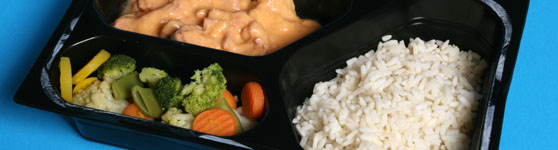 Portionstallrik med grönsaker och ris